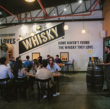 Visitors enjoying a whisky tasting. Credit: The M&H Distillery. 