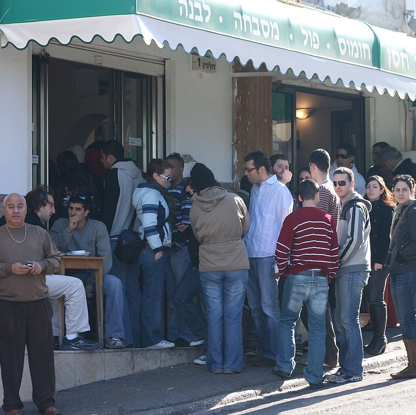 Customers lining up in front of Abu Hassan.