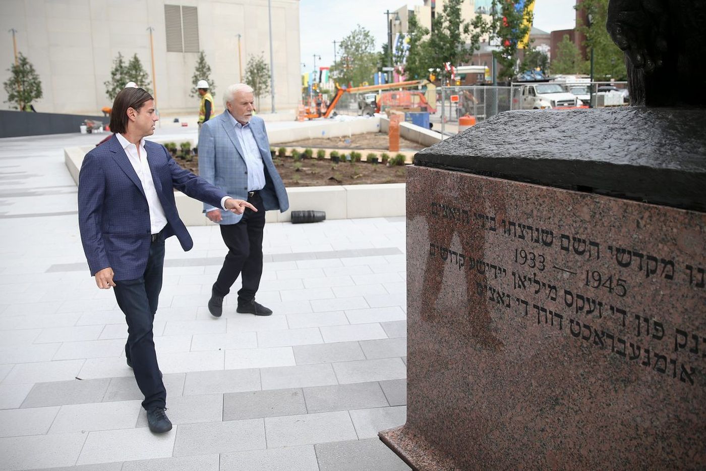 As solemn memorial to Holocaust opens on Parkway, a family and business bond is cemented